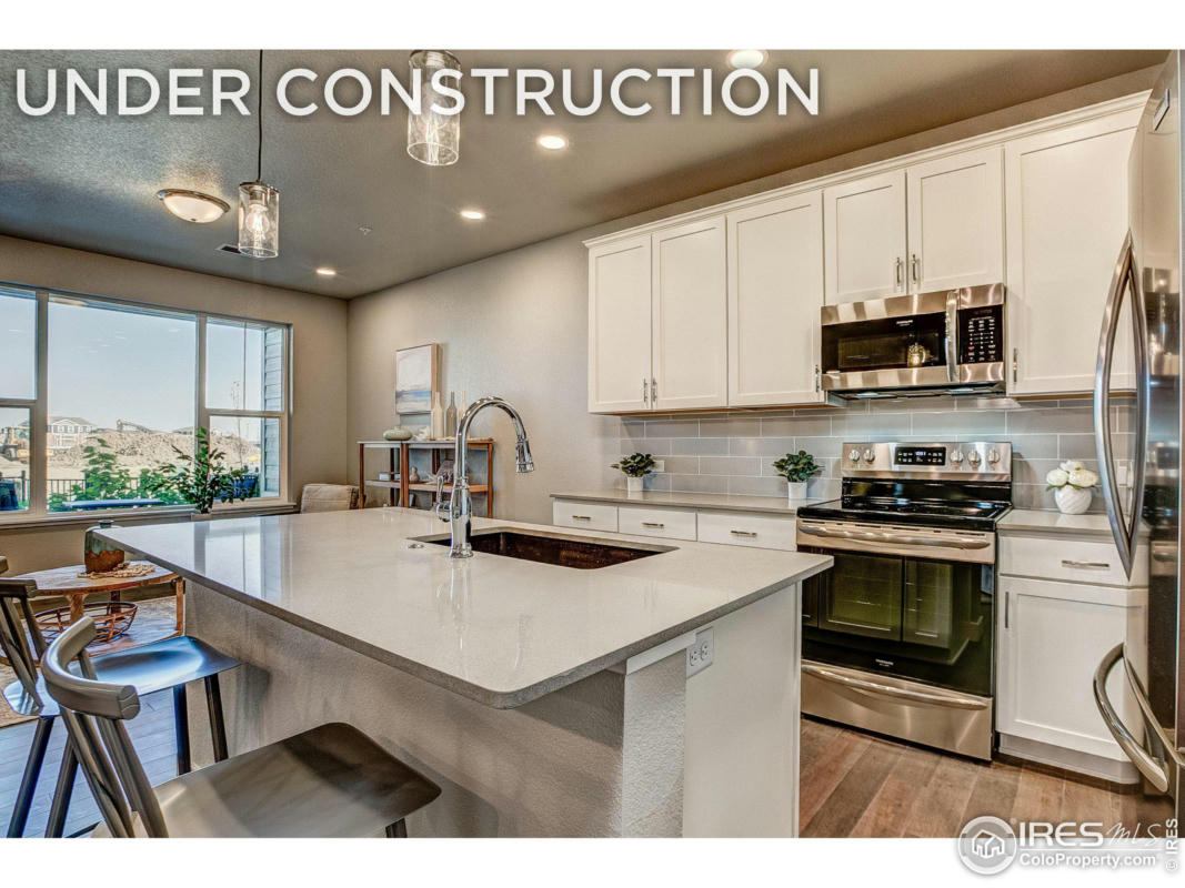 390 HIGH POINT DR # 106, LONGMONT, CO 80504, photo 1 of 20