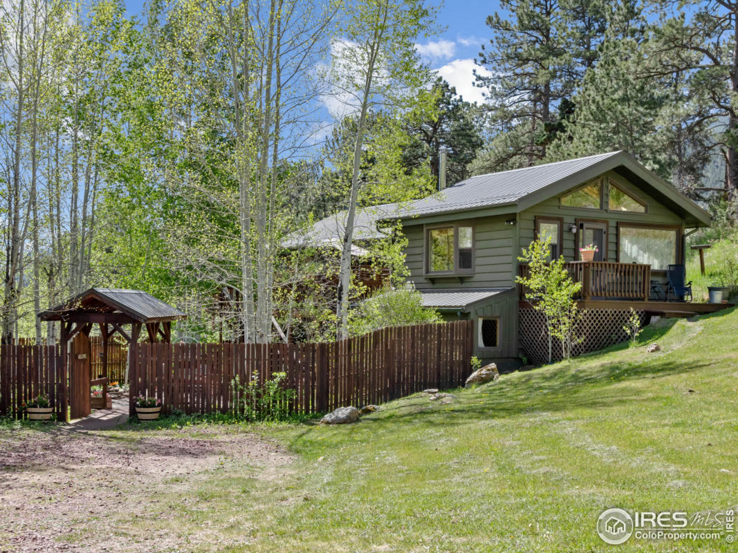 417 DUNRAVEN GLADE RD, GLEN HAVEN, CO 80532, photo 1 of 40